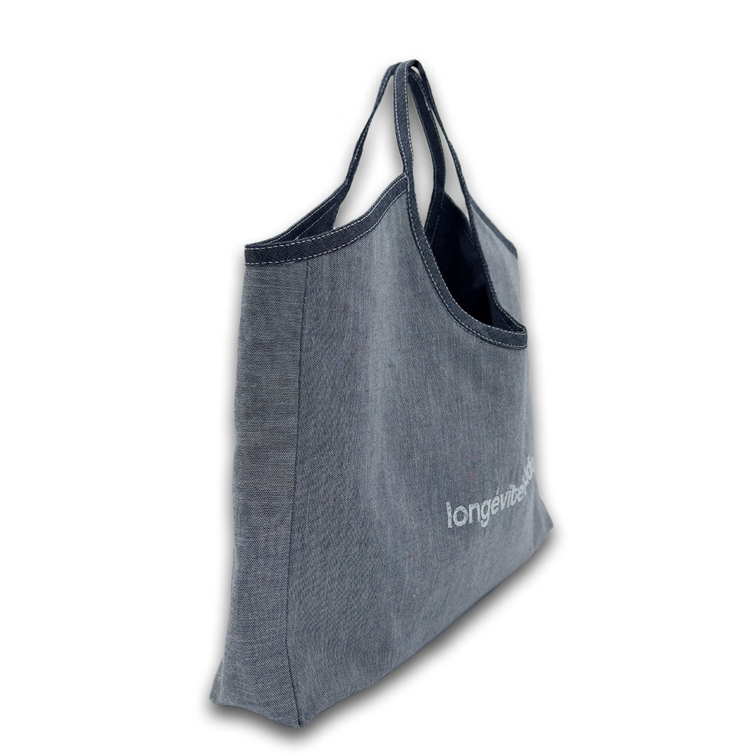 THE HANDHELD ESSENTIAL TOTE